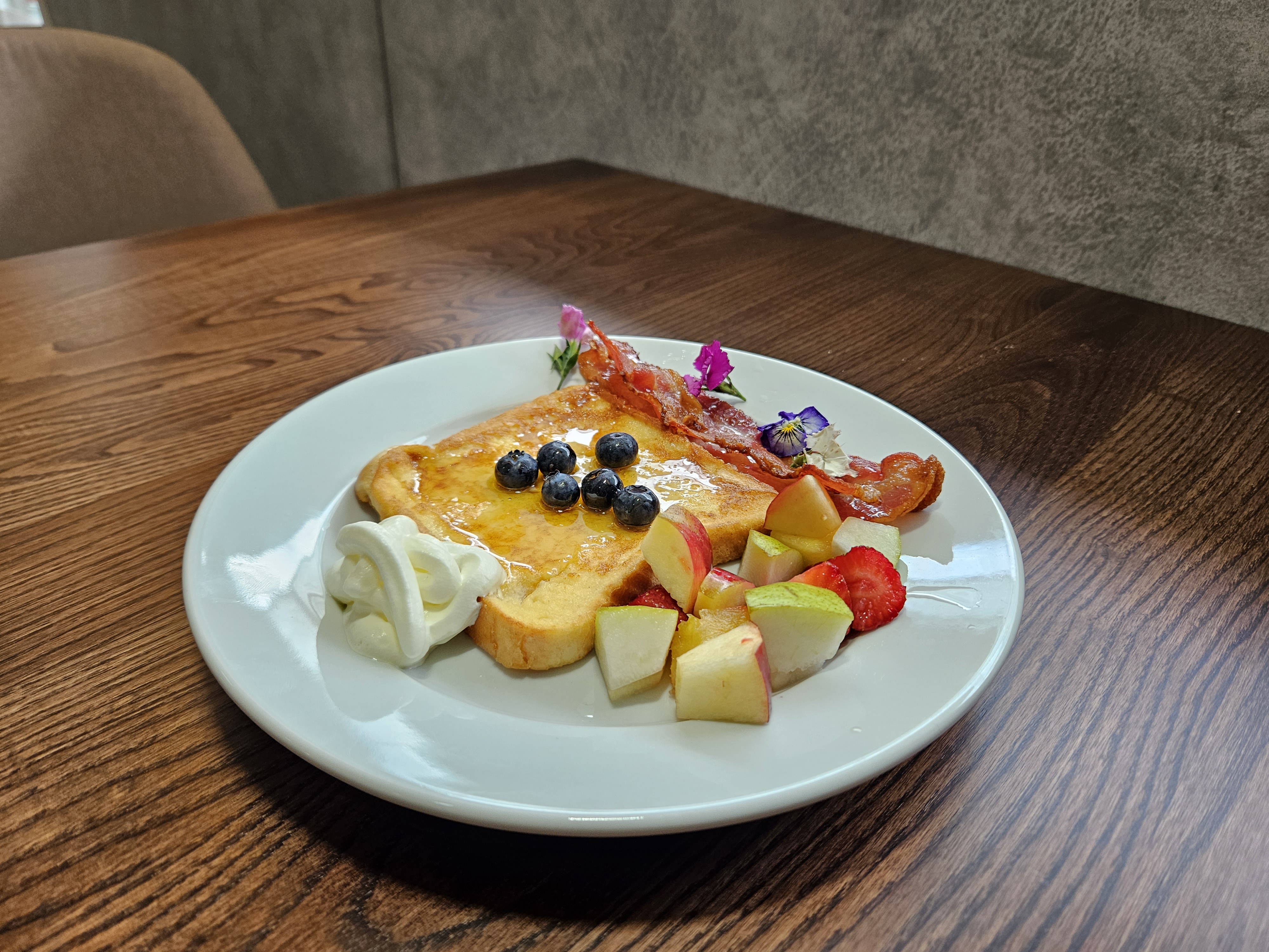 Delicious breakfast spread with fresh pastries and fruits